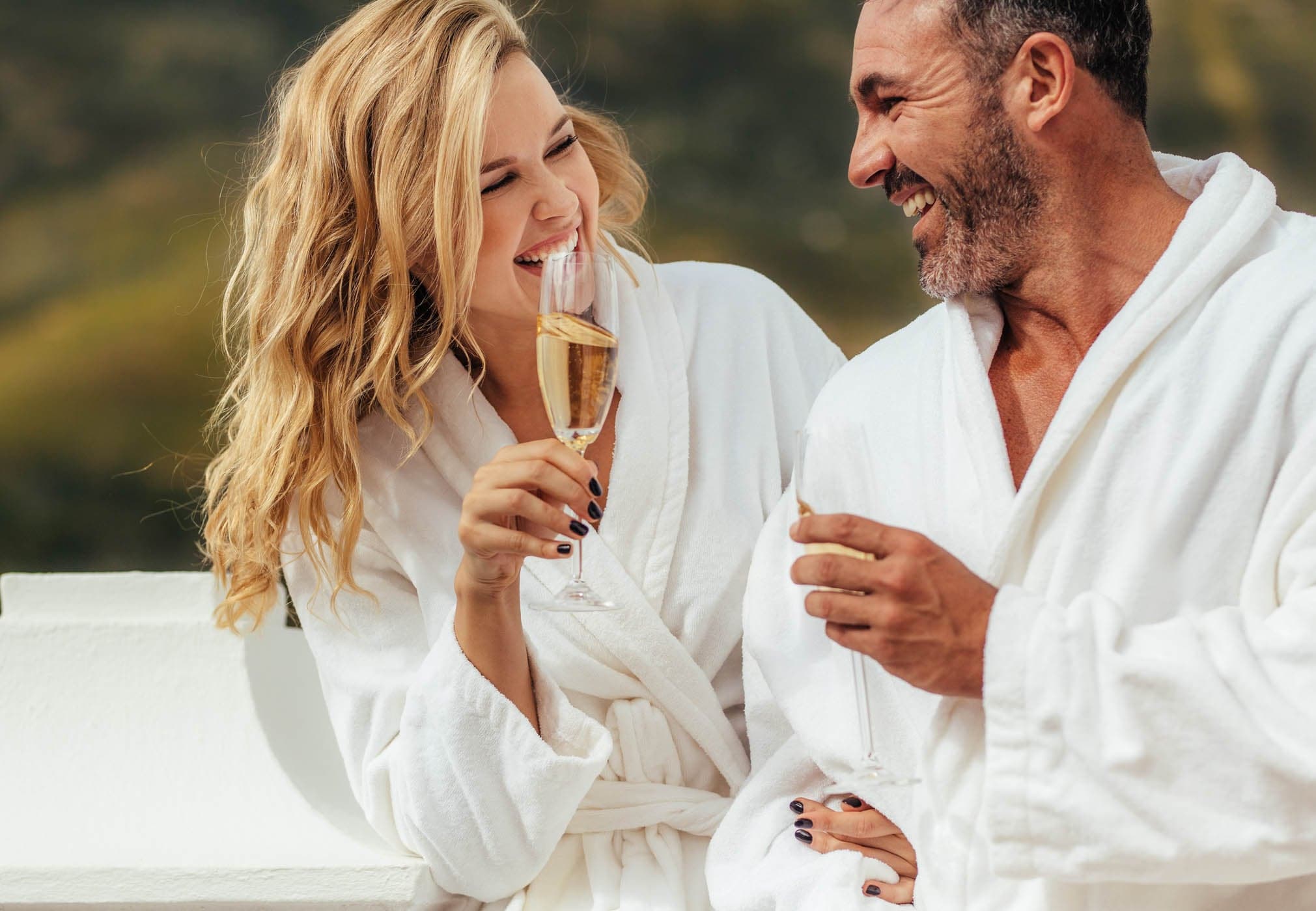 Cheerful Couple In Bathrobe