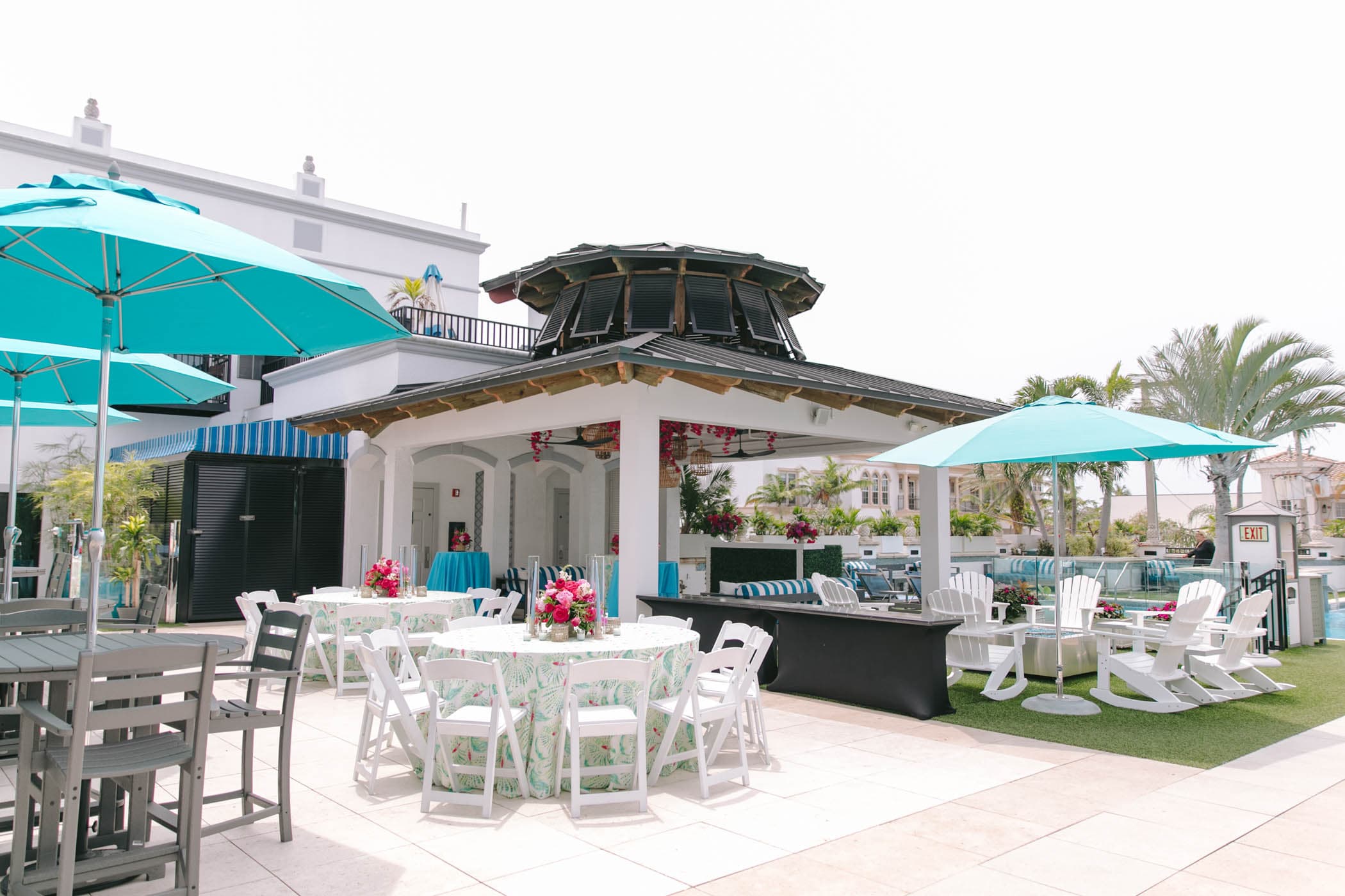 Covered pavilion set with round banquet tables at Inn on Fifth in Naples, FL
