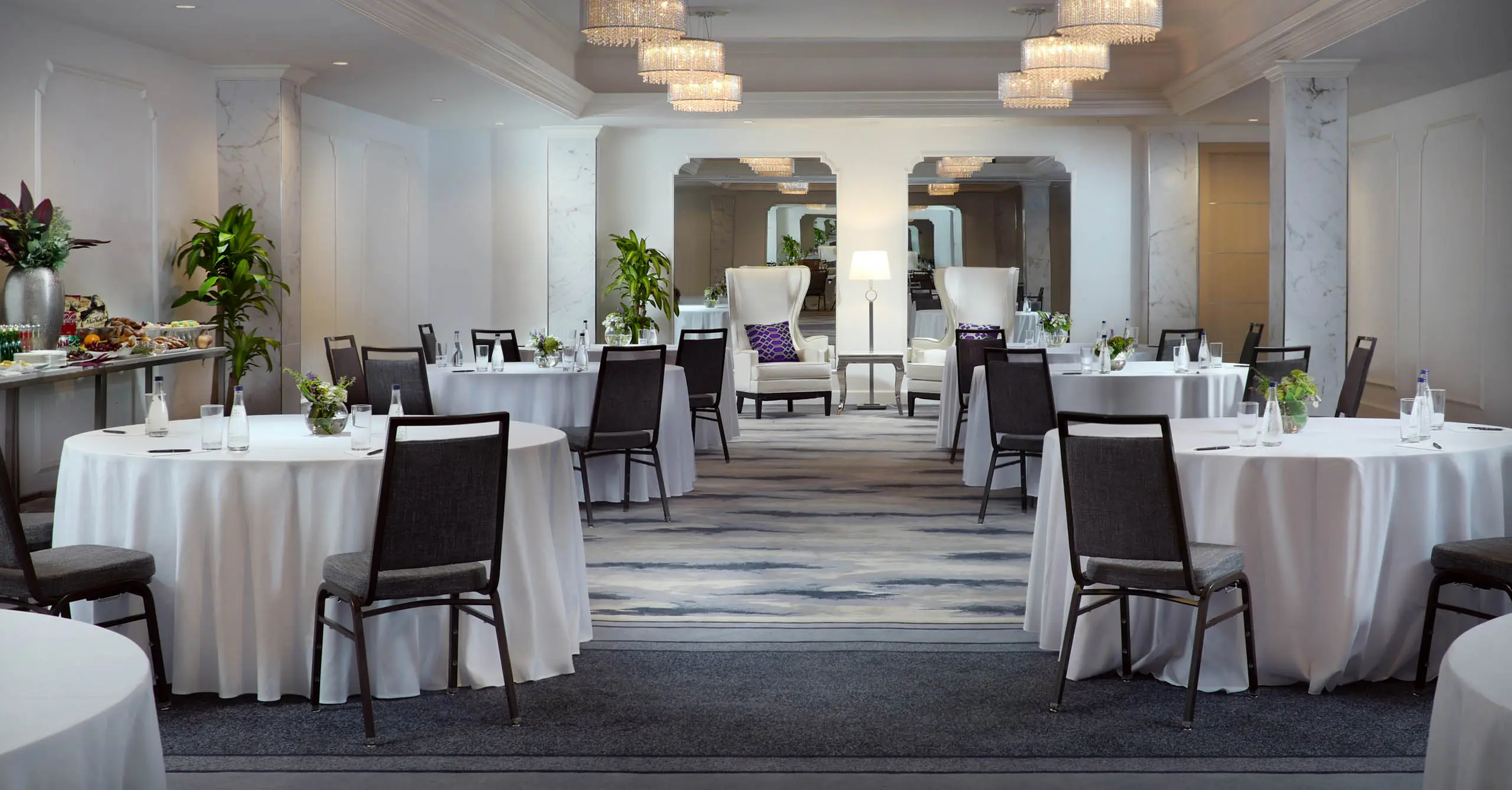 Ballroom with round tables for a corporate event at Inn on Fifth in Naples
