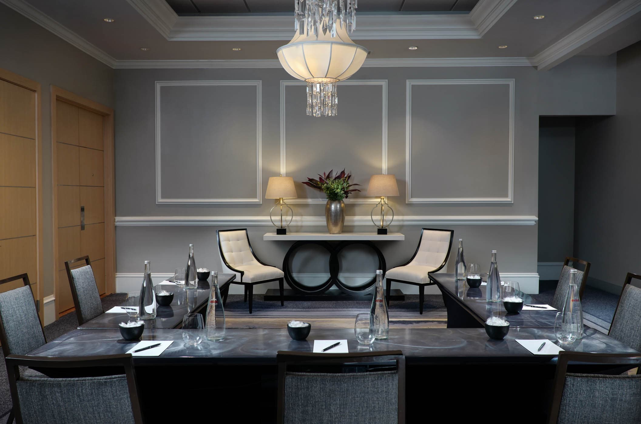 Private room with chandelier at Inn on Fifth in downtown Naples, FL