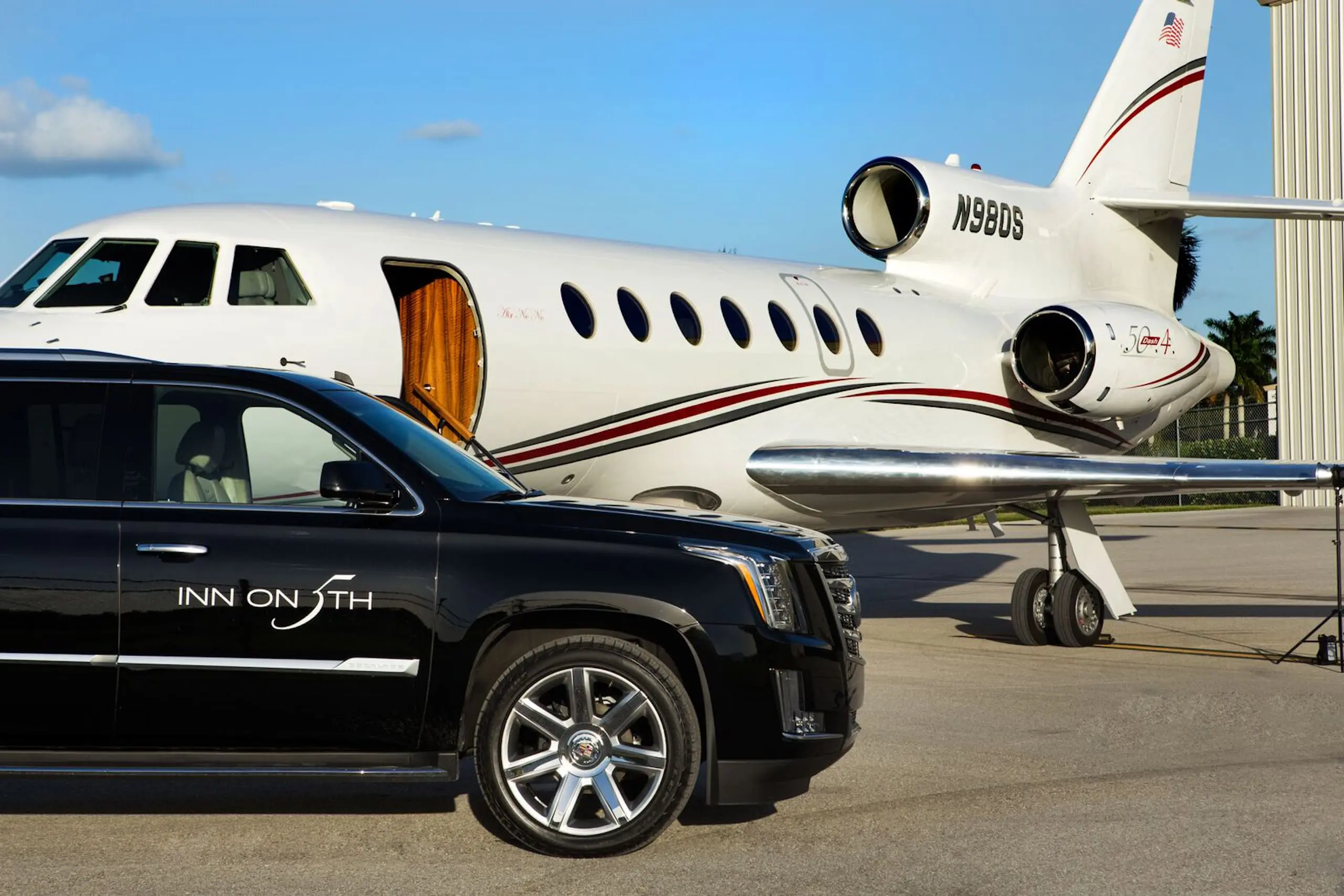 Private jet and car at Naples Municipal Airport in Naples, Florida