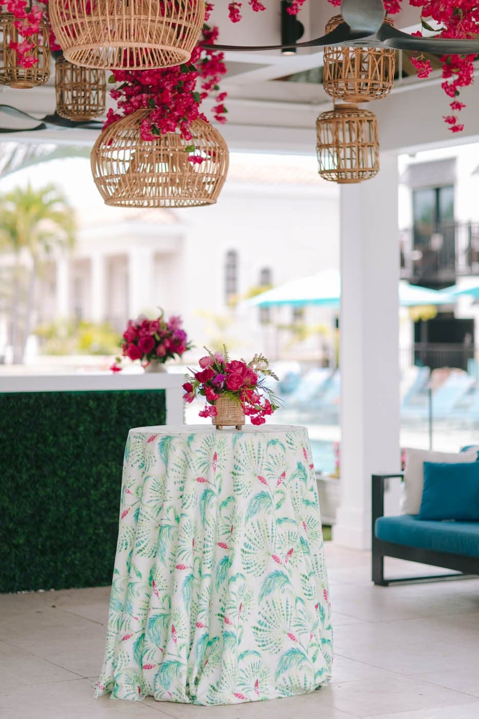Cocktail reception setup with floral centerpieces at Inn on Fifth in Naples