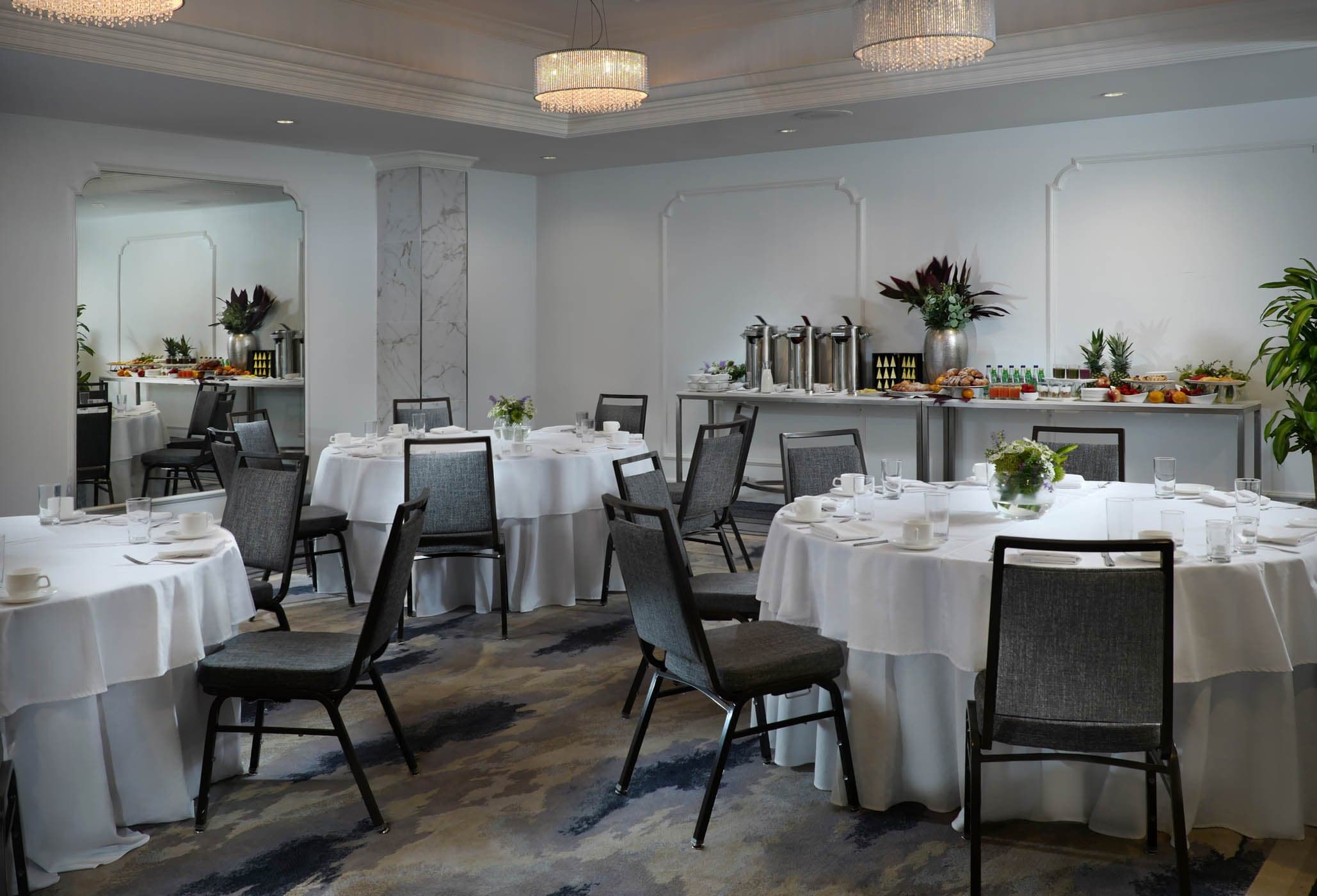 Banquet room with round tables for a reception at Inn on Fifth, Naples, FL