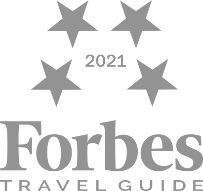 Four Star Forbes Travel Guide Logo