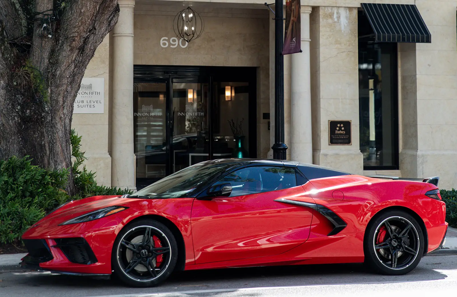 Sports car exterior of club level hotel, Inn on Fifth