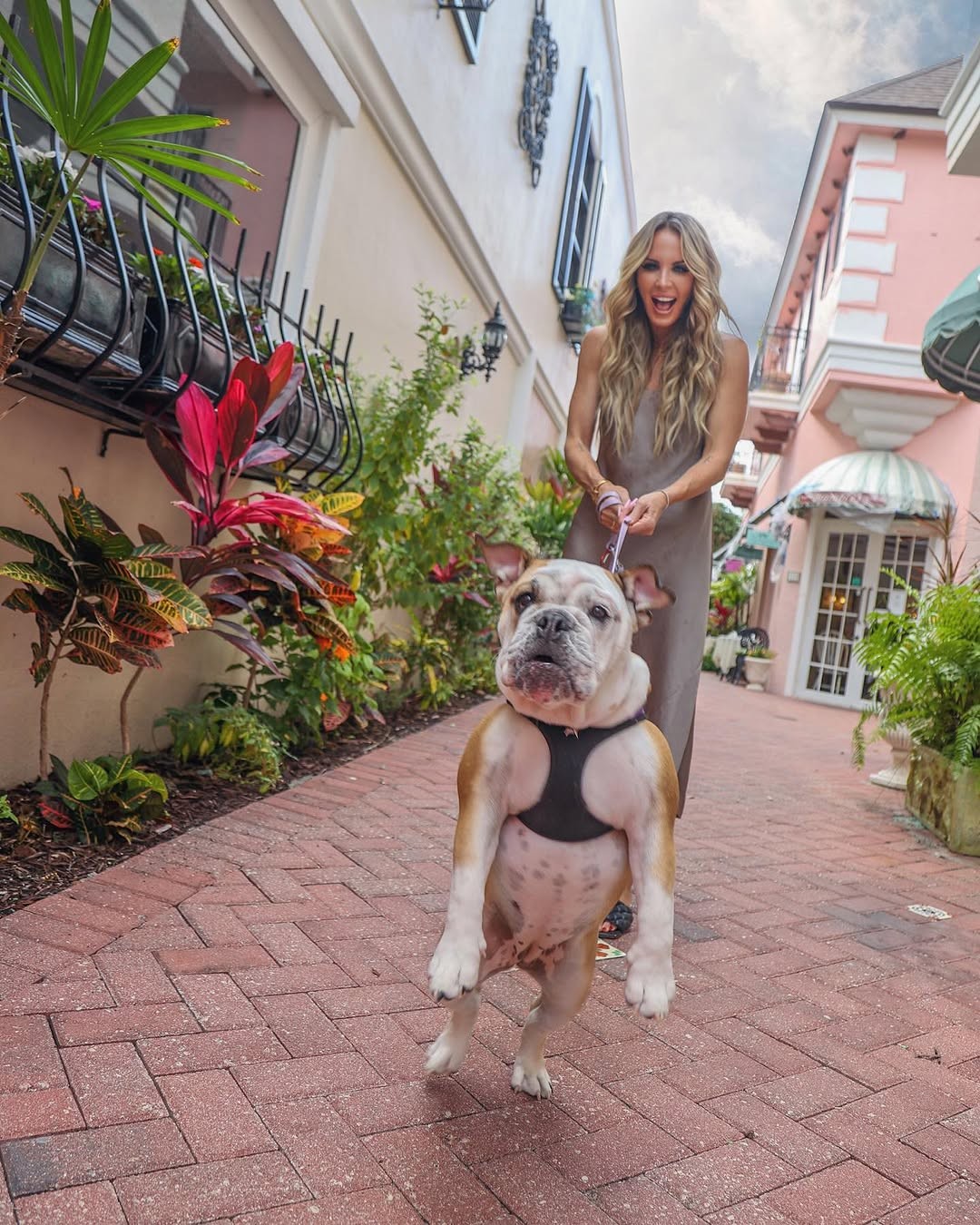 women walking dog